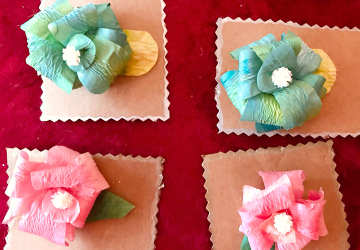 Used Coffee filters can be wash, painted, cut and glued to form flower hair pins.