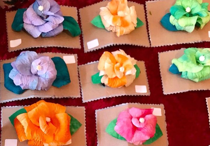 Used Coffee filters can be wash, painted, cut and glued to form flower hair pins.